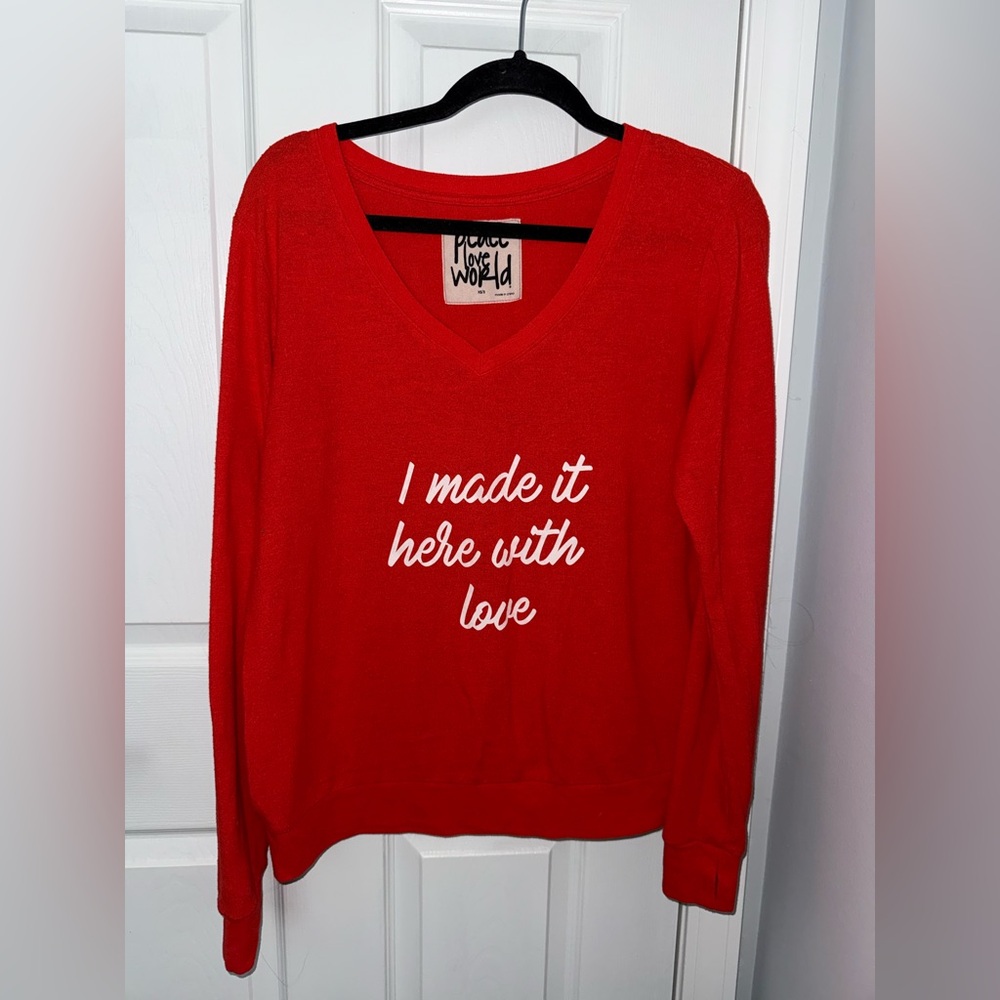 Peace Love World Red Sweater with White Text